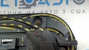 The hatch mechanism of the BMW 3 G20 19-26 frame is covered in soot and melted.