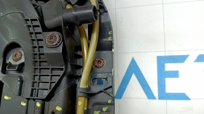 The hatch mechanism of the BMW 3 G20 19-26 frame is covered in soot and melted.