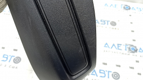 Left side driver's seat trim for a Lincoln Corsair 20-26, black, plastic faded, worn