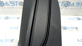 Right side passenger seat trim for Lincoln Corsair 20-26, black, plastic has turned white, and is worn.