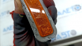 The front bumper reflector, right, BMW 3 G20 19-26, is worn.