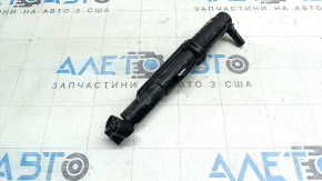The left headlight washer on a BMW X3 F25 2015-2017 has a broken latch.