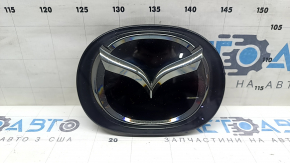 Mazda CX-5 17-24 radiator grille emblem under radar, chipped