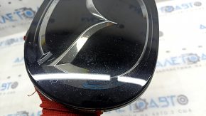 Mazda CX-5 17-24 radiator grille emblem under radar, chipped