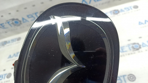 Mazda CX-5 17-24 radiator grille emblem under radar, chipped