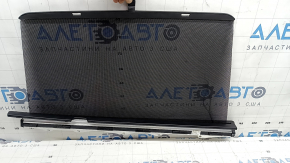 The rear right door curtain of a BMW X3 F25 11-17 is torn and dented.