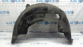 The rear right fender liner of a BMW X3 F25 11-17 has torn fasteners.