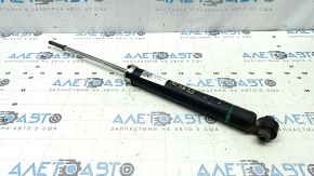 The rear left shock absorber of Toyota Prius 30 14-15 is dented