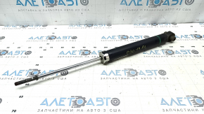 The rear left shock absorber of Toyota Prius 30 14-15 is dented