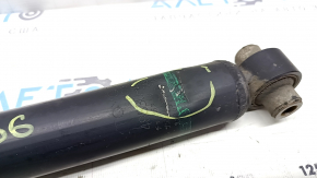 The rear right shock absorber of Toyota Prius 30 14-15 is dented