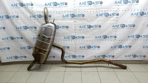 The rear muffler with a barrel for a VW Tiguan 20-24 fwd is dented.
