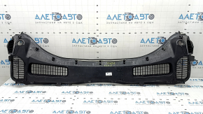 The plastic windshield wiper grille on a Ford Escape MK3 13-19 has broken fasteners.