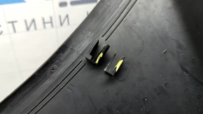 The plastic windshield wiper grille on a Ford Escape MK3 13-19 has broken fasteners.