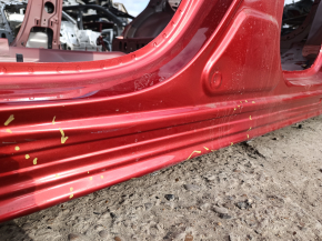 The center left body pillar of a Mazda CX-5 17-24 is on the body, the threshold is dented