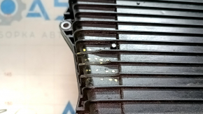 The Audi Q7 16-26 SHS AWD 3.0T automatic transmission pan is cracked.
