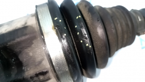 The front right drive axle shaft of a Mercedes X247 GLB 20-26 AWD has a torn boot.