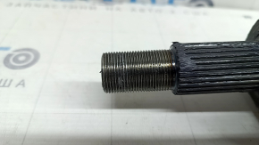 The front right half shaft of a Nissan Rogue 22-23 1.5 AWD has a stripped thread.