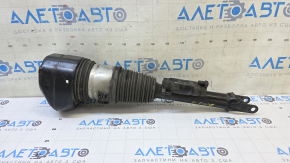 The front left air shock absorber of a BMW 7 G11 G12 16-22 RWD is leaking air.