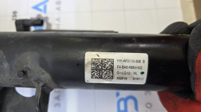 The front left air shock absorber of a BMW 7 G11 G12 16-22 RWD is leaking air.