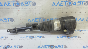 The front left air shock absorber of a BMW 7 G11 G12 16-22 RWD is leaking air.