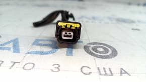 Yellow chip for the front center airbag sensor on a 2021-23 Nissan Rogue.