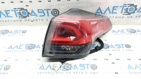 The right outer fender light of a Toyota Rav4 16-18 LED is fogged up.