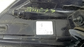 The right outer fender light of a Toyota Rav4 16-18 LED is fogged up.