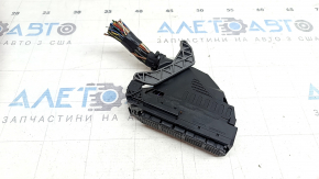 The Toyota Rav4 16-18 hybrid AWD engine computer ECU chip is large.