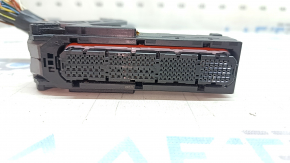 The Toyota Rav4 16-18 hybrid AWD engine computer ECU chip is large.