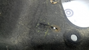 The front left fender liner of a Honda Accord 23-26 is torn.