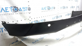 The bare rear bumper, the lower part of the Toyota Rav4 16-18, is structured for parking sensors.