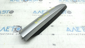 The front left longitudinal roof rail cover for a Toyota Rav4 13-18 has a broken mount.