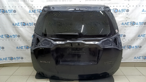 The bare trunk door of a Toyota Rav4 16-18 with electrics and a camera