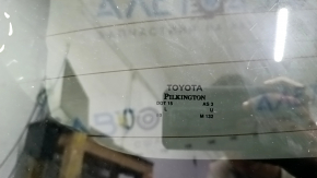 The bare trunk door of a Toyota Rav4 16-18 with electrics and a camera