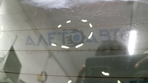 The bare trunk door of a Toyota Rav4 16-18 with electrics and a camera