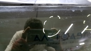 The bare trunk door of a Toyota Rav4 16-18 with electrics and a camera