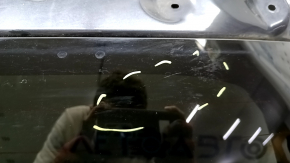 The bare trunk door of a Toyota Rav4 16-18 with electrics and a camera