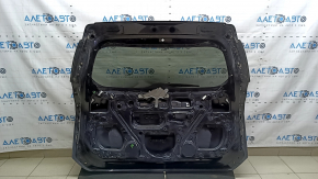The bare trunk door of a Toyota Rav4 16-18 with electrics and a camera