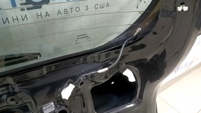 The bare trunk door of a Toyota Rav4 16-18 with electrics and a camera