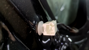 The bare trunk door of a Toyota Rav4 16-18 with electrics and a camera