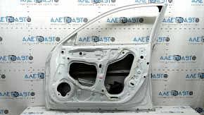 The door is bare, front right, Honda Accord 23-26, white, NH-883P, dented.
