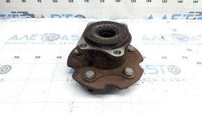 The rear right hub of a Toyota Rav4 13-18 AWD is rusty.