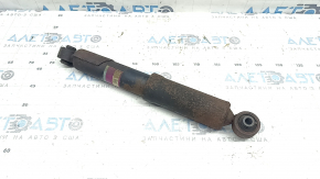 The rear right shock absorber of a 16-18 Toyota Rav4 hybrid is rusty.