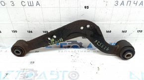 The upper rear right control arm of a Toyota Rav4 13-18 is rusty.