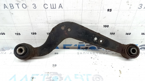 The upper rear right control arm of a Toyota Rav4 13-18 is rusty.