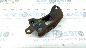 The rear left trailing arm bracket for a Toyota Rav4 13-18 is rusty.
