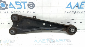 The rear right longitudinal control arm of a Toyota Rav4 13-18 AWD is rusty, the silent block needs replacing.