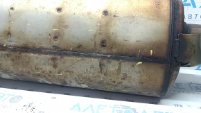 The exhaust pipe, middle section of a 1998 Toyota Rav4 hybrid, is rusty, dented, and has a broken stud.