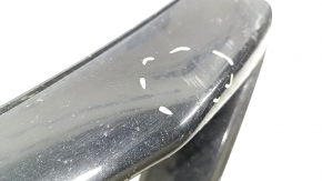 Lower grille trim for the front bumper of a Honda Accord 2016-2017 hybrid, glossy black, scratches