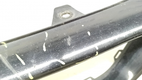 Lower grille trim for the front bumper of a Honda Accord 2016-2017 hybrid, glossy black, scratches